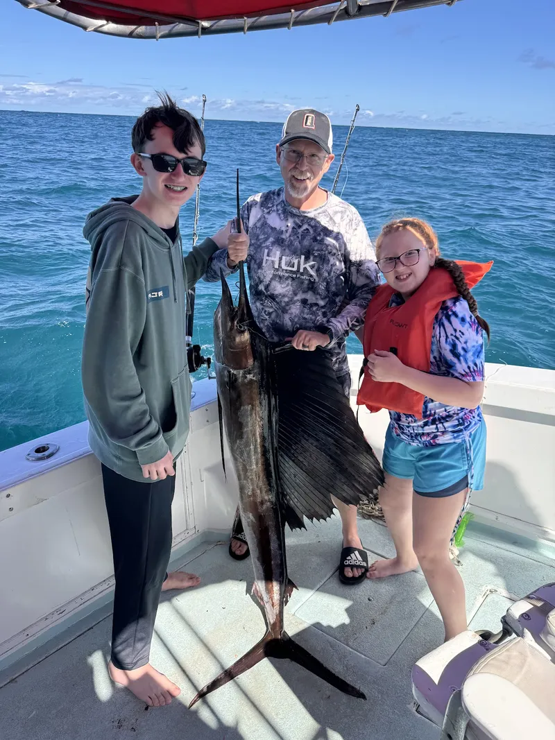 Smiles says it all! Another happy family after a thrilling day of fishing in Punta Cana waters